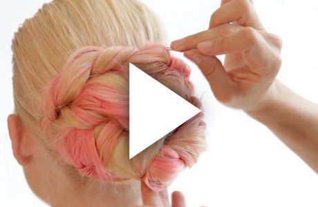 Twisted hair-do with pink extensions